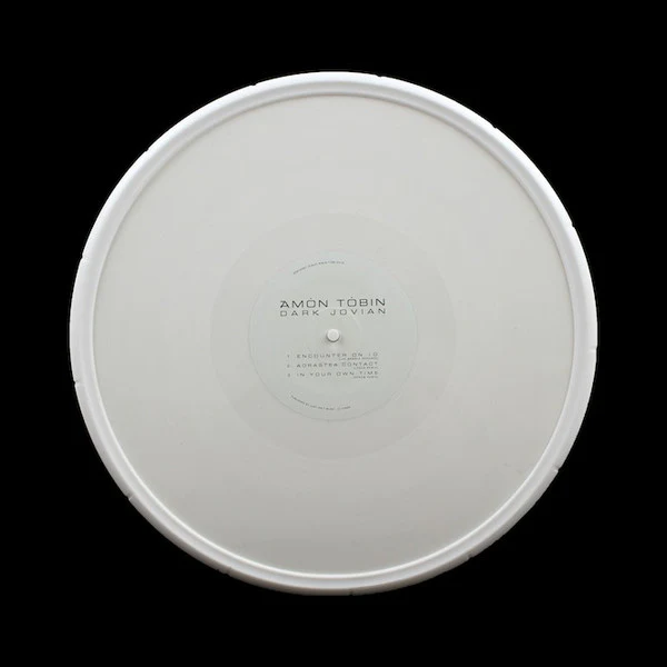 AMON TOBIN, Dark Jovian (Ninja Tune; ZEN12387, UK 2015, Stickered Plastic Box., Rubber Ring, Limited To 500 Copies. Etched, White Vinyl.) 2x12" VG/VG - Image 2