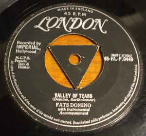 FATS DOMINO, Valley Of Tears / It's You I Love (London Records; 45-HL-P.8449, UK 1957, Company Sleeve) 7" VG+/VG+