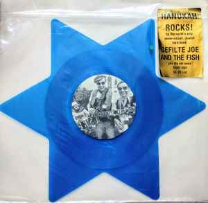 GEFILTE JOE AND THE FISH, Hanukah Rocks (Rhino Records; RNEP 650, US 1981, Clear Plastic Stickered Sleeve, Translucent blue vinyl star shaped picture disc.) 12" VG/G+