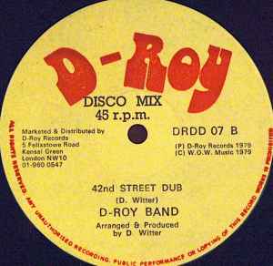 JACKIE / D-ROY BAND, Girl Over Board / 42nd Street Dub (D-Roy Records; DRDD 07, UK 1979, Company Sleeve) 12" VG/VG - Image 2