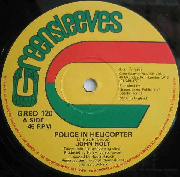 JOHN HOLT, Police In Helicopter / Youths Pon The Corner (Greensleeves Records; GRED 120, UK 1983, Company Sleeve) 12" VG+/VG - Image 2