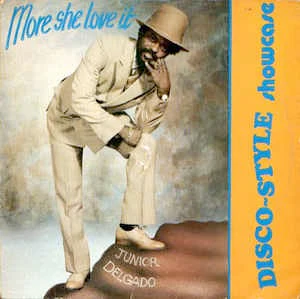 JUNIOR DELGADO, More She Love It Showcase (Yvonne's Special; YS001, UK 1981, Blue Vinyl) LP G+/G+