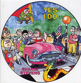 SHAKIN' STEVENS, Yes I Do (Epic; SHAKY P12, UK 1990s, Clear Plastic Sleeve, Picture Disc featuring Viz Comic characters) LP /VG+
