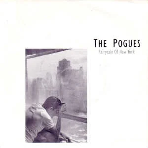 THE POGUES, Fairytale Of New York/ The Battle March Medley (Stiff; NY 7, UK 1987, Picture Sleeve, Silver Injection-Moulded Labels) 7" VG/VG
